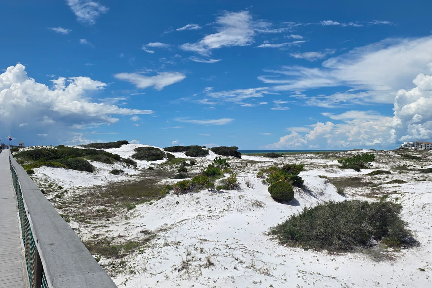 Aerial view of the Gulf, beach, and a dune lake beside 30A
